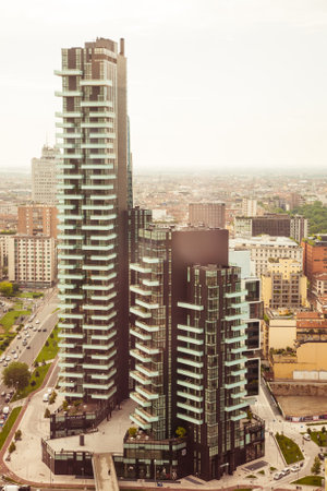 Milan, Italy - 2016, May 14 : The Solaria Tower, a modern residential skyscraper as seen from the Unicredit tower in the Porta Nuova district of the Italian city of Milan, Lombardy, Italyのeditorial素材