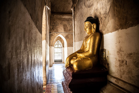 Bagan, Myanmar - 2016, December 27 : A buddha statue in the corridor of the 11th century Gawdawpalin temple in Old Bagan in Myanmar or Burmaのeditorial素材