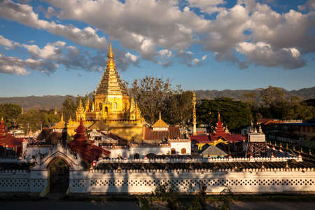 The main buddhist temple complex of Yadana Man Aung in the town of Nyaungshwe on the Inle Lake in the Shan state of central Myanmarの写真素材