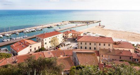 An aerial view on the recreational harbor and beach of Castiglione della Pescaia in Tuscany, Italyの写真素材