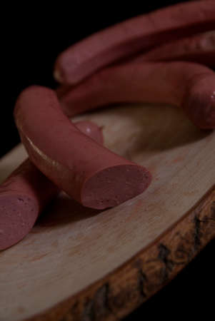 Frankfurter Sausages on a Piece of Wooden