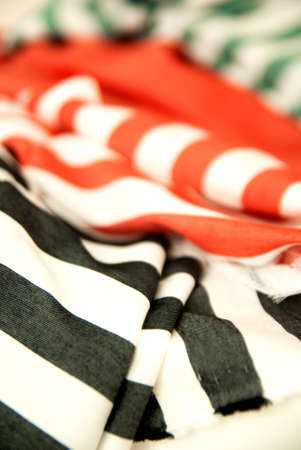 Black, Blue and Red Striped Fabric Folded. Textile Productsの写真素材