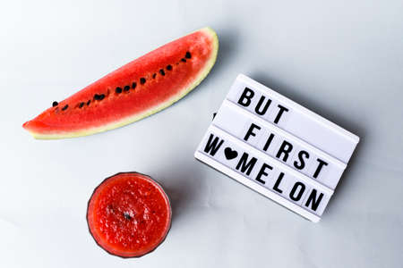 Watermelon Sliced with Watermelon Juice on a Gray Backgroundの写真素材