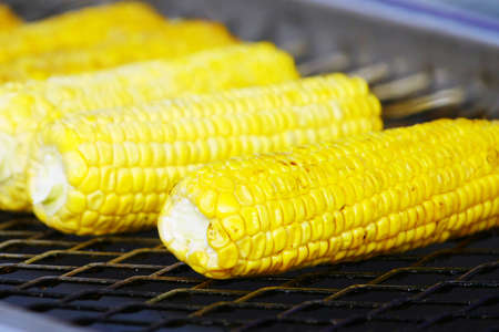 Grilled corn on the barbecueの写真素材