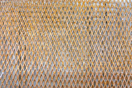 old rusty metal grating backgroundの写真素材