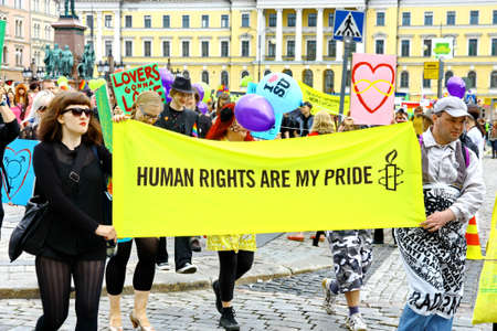 HELSINKI, FINLAND - JUNE 30: Unidentified people take part in the annual Helsinki Pride gay parade...