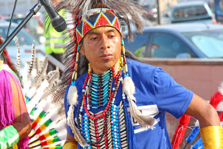 MOSCOW, RUSSIA - JUNE 1: Native American Indian tribal group play music and sing in the street for...