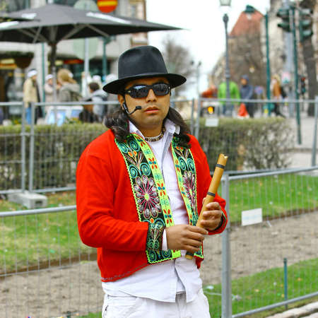 HELSINKI, FINLAND - MAY 1: Native American Indian tribal group play music and sing in the street for tourists and city dwellers on May 1, 2011 in Helsinki, Finlandのeditorial素材