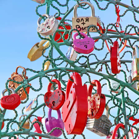 Tree of Love, Luzhkov Bridge  Moscow, Russia  Padlocks in the shape of a heart - a symbol of eternal love and union のeditorial素材