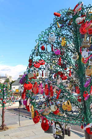 MOSCOW, RUSSIA - JULE 25: Trees of love on Luzhkov bridge on Jule 25, 2013 in Moscow, Russia. The sculpture in the form of a tree for newlyweds and lovers, to hang padlocks as a symbol of love. のeditorial素材