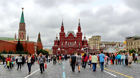 MOSCOW - JULY 20: Tourists visiting the Red Square on july 20, 2013 in Moscow, Russia. The Red Square and the Kremlin are the main attractions in Moscowのeditorial素材