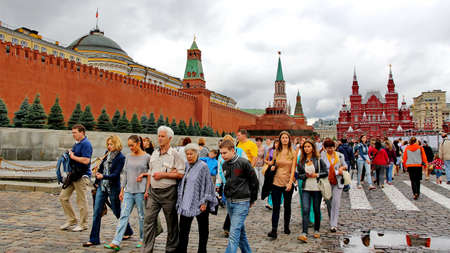 MOSCOW - JULY 20: Tourists visiting the Red Square on july 20, 2013 in Moscow, Russia. The Red...