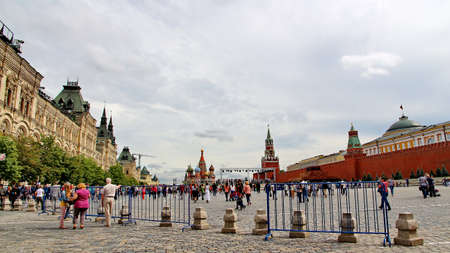 MOSCOW - JULY 20: Tourists visiting the Red Square on july 20, 2013 in Moscow, Russia. The Red Square and the Kremlin are the main attractions in Moscowのeditorial素材