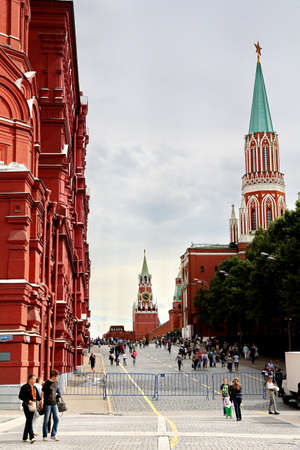 MOSCOW - JULY 20: Tourists visiting the Red Square on july 20, 2013 in Moscow, Russia. The Red Square and the Kremlin are the main attractions in Moscowのeditorial素材