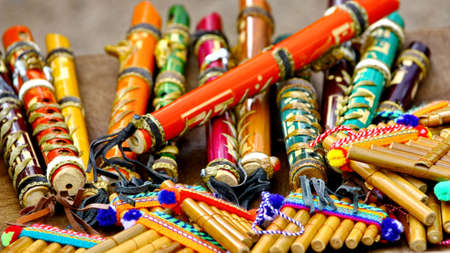 Native American colorful Andean flutes on artisan traditional product market
の写真素材