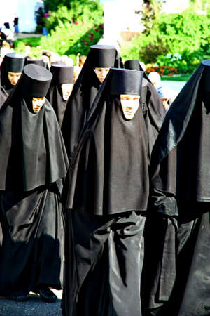 MALOYAROSLAVETS, RUSSIA - AUGUST 19, 2012: Nuns take part in the religious procession in Monastery of St. Nicholas in the ancient Russian city Maloyaroslavets. For editorial use only.のeditorial素材