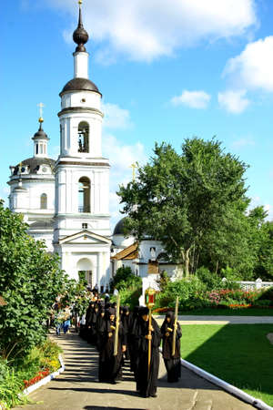 MALOYAROSLAVETS, RUSSIA - AUGUST 19, 2012: Nuns take part in the religious procession in Monastery of St. Nicholas in the ancient Russian city Maloyaroslavets. For editorial use only.のeditorial素材