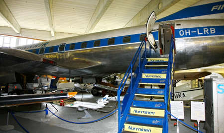 VANTAA, FINLAND - JUNE 10, 2015: Interior view of The Aviation Museum in Vantaa. The exhibition presents historic military aircraft used by the Finnish Air Force. For editorial use only.のeditorial素材