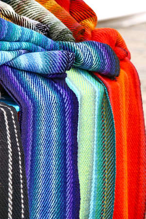 Colorful scarves at market. Colors of textiles.の写真素材