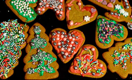 Homemade christmas cookies on a dark tableの写真素材