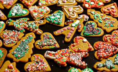 Homemade christmas cookies on a dark tableの写真素材