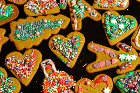 Homemade christmas cookies on a dark tableの写真素材