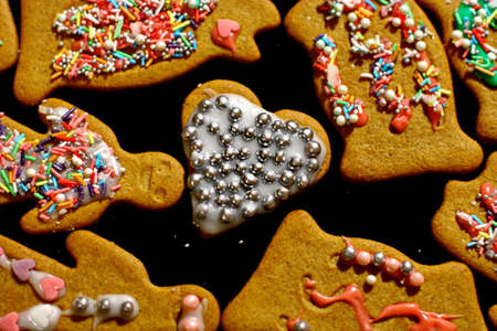 Homemade christmas cookies on a dark tableの写真素材