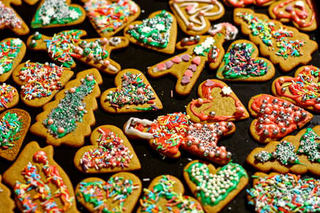 Homemade christmas cookies on a dark tableの写真素材