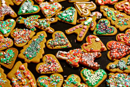 Homemade christmas cookies on a dark tableの写真素材