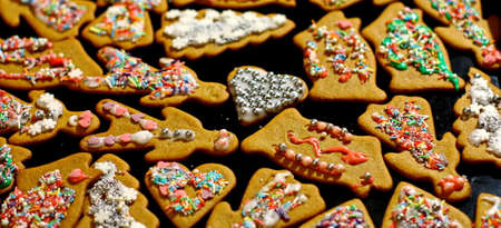 Homemade christmas cookies on a dark tableの写真素材