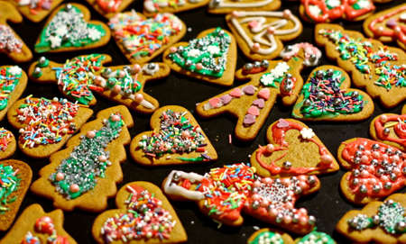 Homemade christmas cookies on a dark tableの写真素材
