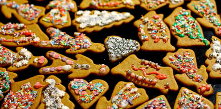 Homemade christmas cookies on a dark tableの写真素材