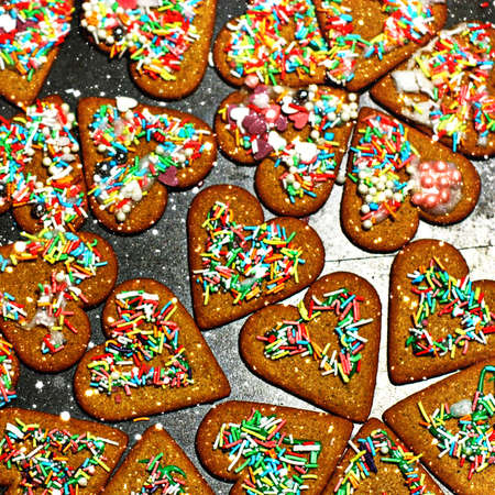Homemade christmas cookies on a dark tableの写真素材