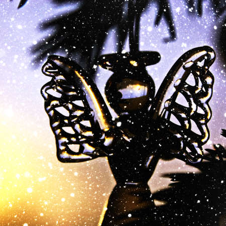 Toy glass angel decoration on the xmas treeの写真素材