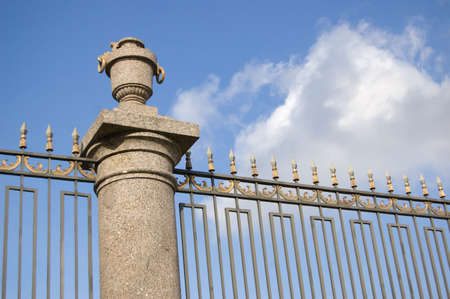 Ornate grate on sky backgroundの写真素材