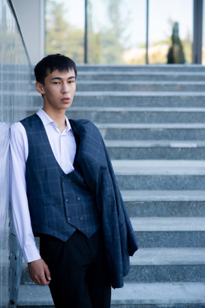 Oriental asian man in suit in downtownの写真素材
