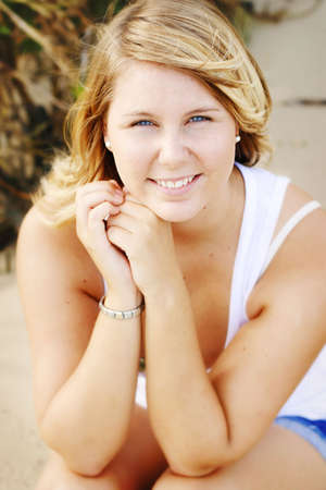 Beautiful young caucasian woman at the beachの写真素材