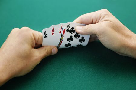 Aces and jack ten double suited is a premium starting hand in Omaha High Low poker.