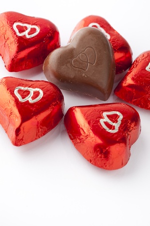 Delicious chocolate hearts for Valentine's day on a white backgroundの写真素材