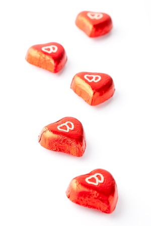 Delicious chocolate hearts for Valentine's day on a white backgroundの写真素材