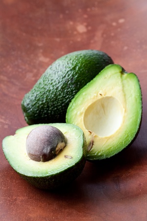 Close-up of avocados on a wooden backgroundの写真素材