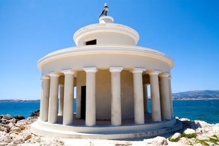Lighthouse  with blue sea in the background in Argostoli, Kefalonia, Greeceの写真素材