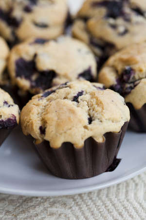 Close-up on delicious and healthy home-made blueberry muffinsの写真素材