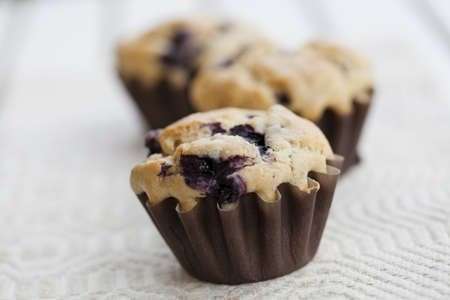Close-up on delicious and healthy home-made blueberry muffinsの写真素材