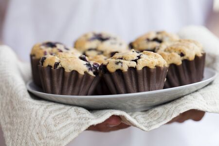 Close-up on delicious and healthy home-made blueberry muffinsの写真素材