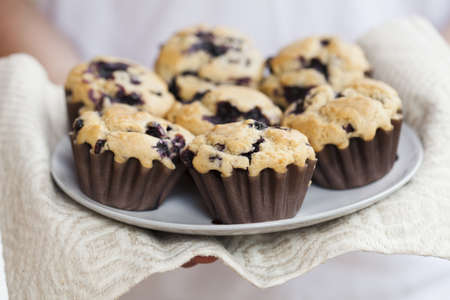 Close-up on delicious and healthy home-made blueberry muffinsの写真素材