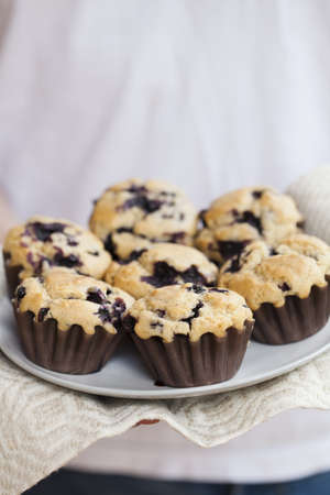 Close-up on delicious and healthy home-made blueberry muffinsの写真素材