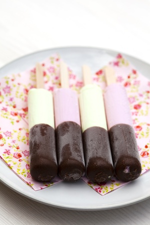Close-up of delicious ice-cream sticks with chocolate coatingの写真素材