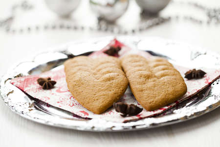 Close-up of delicious heart shape Christmas gingerbread cookies on a plateの写真素材
