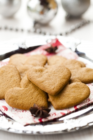 Close-up of delicious heart shape Christmas gingerbread cookies on a plateの写真素材